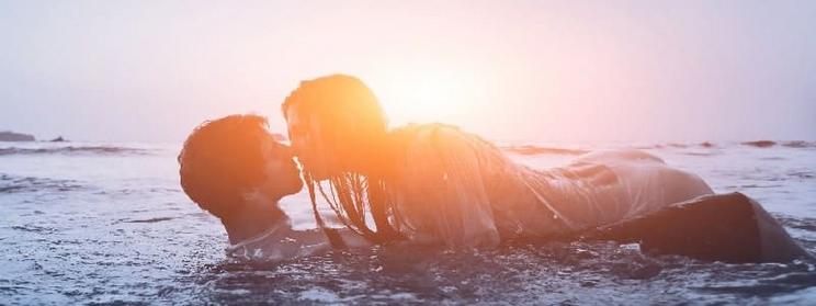 Naiads Love Spell And Call For Romance, A loving couple passionately embracing each other at sunset on the beach, the woman found her perfect partner after ordering this Powerful enchantment.