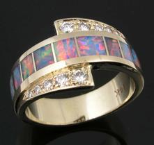 Hileman opal ring repaired to new condition.