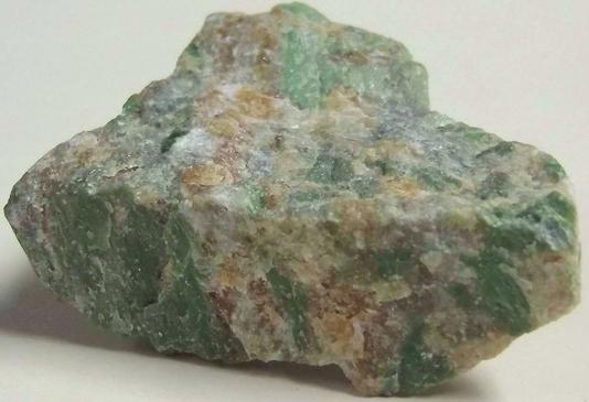 rodingite: green Cr Diopside, orange Grossular garnet, Hunting Hill quarry (Rockville Crushed Stone Quarry; Travilah Quarry; Rockville Quarry; Bardon Stone Quarry; Aggregate Industries Quarry), Rockville, Montgomery County, Maryland, USA