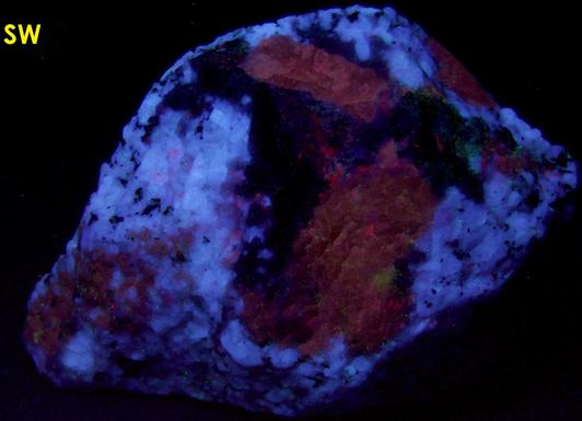 fluorescent SCAPOLITE, CORUNDUM SAPPHIRE, PLAGIOCLASE ALBITE ANORTHITE, BIOTITE -York River area, Dungannon Township, Hastings County, Ontario, Canada