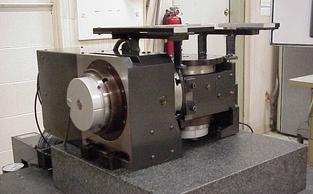 A custom built optical grinding assembly