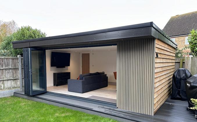 Large modern garden room with pool table and bar