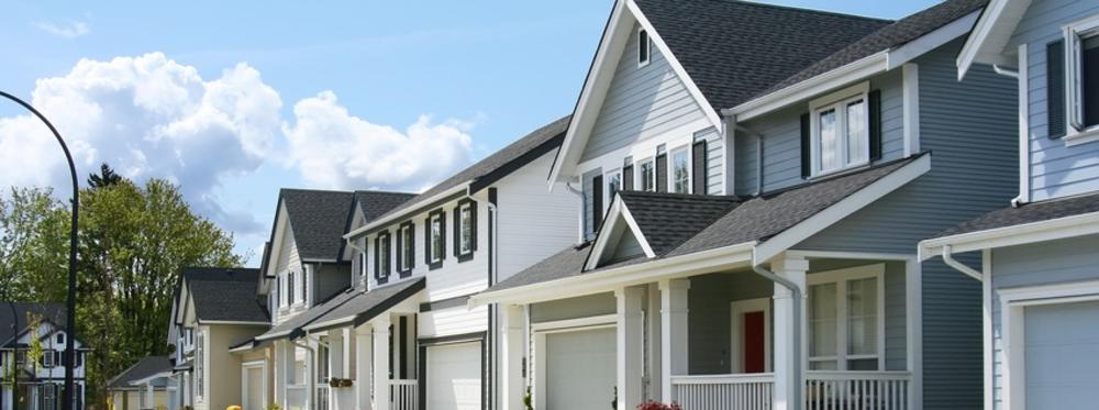 beautiful townhouses in gray, white, and tan