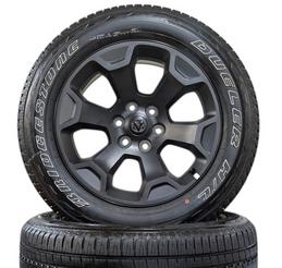 2025 RAM 1500 BIG HORN NIGHT EDITION 6 LUG 20" ALUMINUM PAINTED CLAD WHEEL WITH 275/55R20 BRIDGESTONE DUELER H/L OWL TIRE