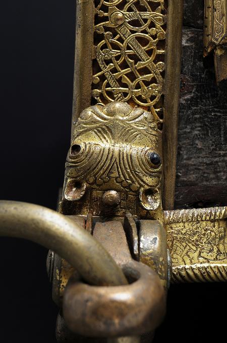 Bronze cast of serpent on Saint Manchan's Shrine. Photography by Kevin O'Dwyer