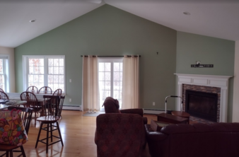 Living room walls painted with "sherwood green".