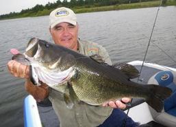 Bridgemaster Fishing Products' employee Lee Sisson's big bass