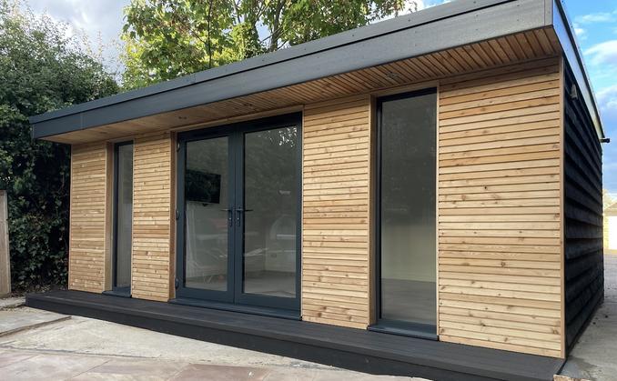 Large modern garden room with pool table and bar