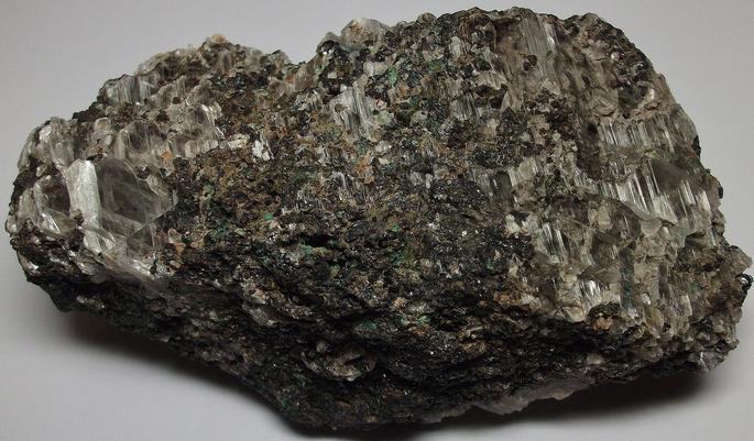 GYPSUM, MAGNETITE, fluorescent CALCITE, MALACHITE - Sterling Mine, Sterling Hill, Ogdensburg, Franklin Mining District, Sussex County, New Jersey, USA