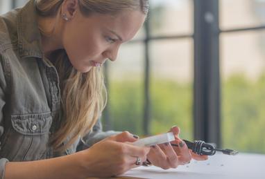 woman holding product design engineering stock