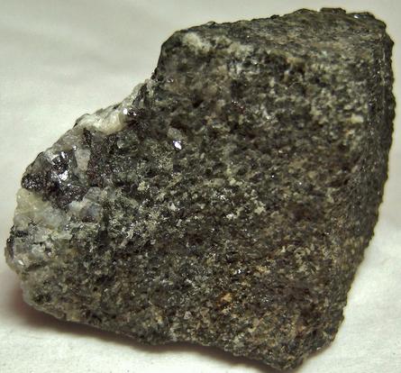 Graphite, fluorescent Meionite Scapolite, green pyroxene - Lead Hill Mines (Chilson Hill mine), Ticonderoga, Ticonderoga Township, Essex County, New York, USA