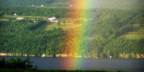 alt="Seneca Lake and Hillsides with bright rainbow"