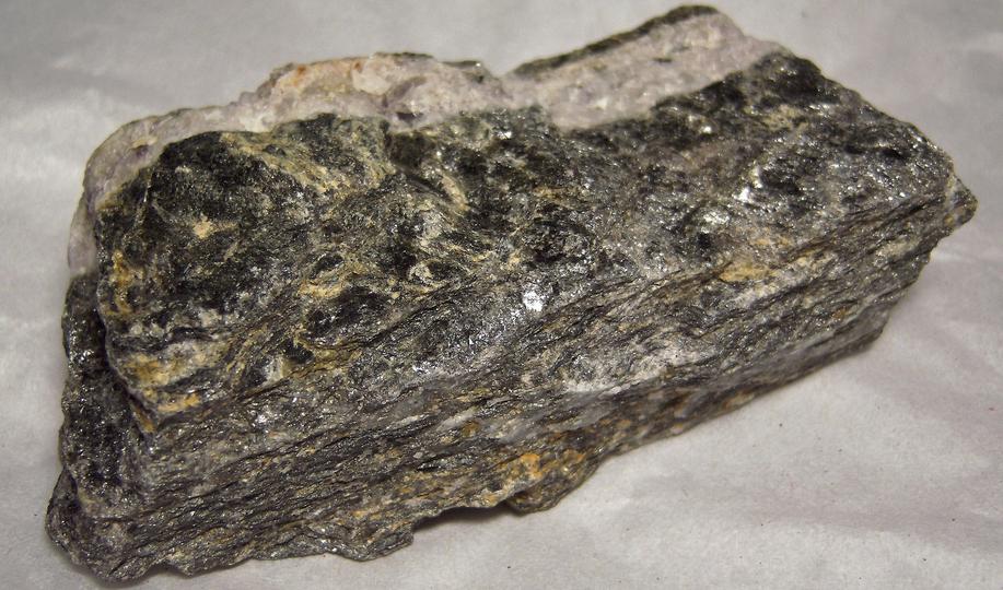fluorescing FLUORITE, CALCITE, PYRITE with MUSCOVITE - Thomaston Dam railroad cut, Thomaston, Litchfield County, Connecticut, USA