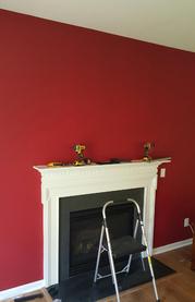 before Carolina Custom Mounts installed flat screen tv over fireplace with floating glass shelf below, flat screen tv mounting service