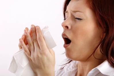 Woman Sneezing