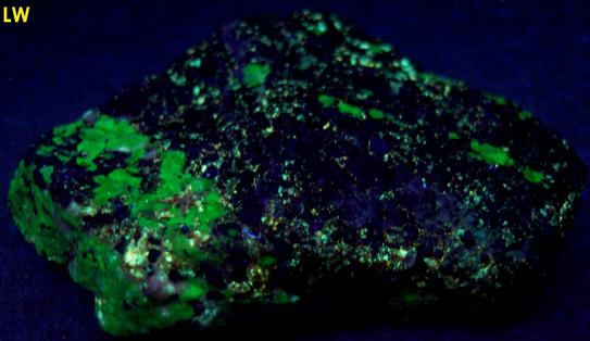 fluorescent WILLEMITE, HYDROZINCITE, CALCITE, FRANKLINITE and ZINCITE - Sterling Mine, Sterling Hill, Ogdensburg, Franklin Mining District, Sussex County, New Jersey, USA – Franklinite and Zincite type locality