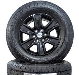 FORD 6 LUG 18" F150 POWDER COATED GLOSS BLACK BRIDGESTONE DUELER AT REVO 3