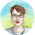 portrait of a woman with short reddish hair and glasses