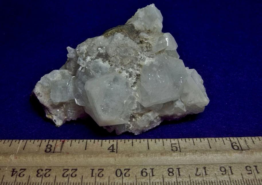 fluorescing FLUORAPOPHYLLITE, QUARTZ, LAUMONTITE - Prospect Park Quarry (Sowerbutt Quarry; Vandermade Quarry; Warren Brothers Quarry), Prospect Park, Passaic County, New Jersey, USA - ex Parker Minerals - for sale