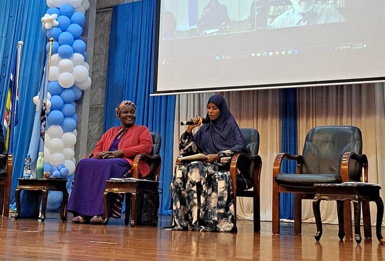 Mariam Abdirashid shares her story as her intergenerational mentor, Rev. Jane Jilani, looks on