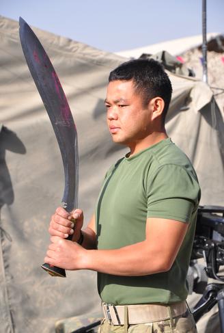 Ceremonial kukri held by Gurkha soldier in Afghanistan