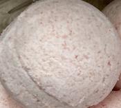An image of a Signature Scent Bath Bomb, showcasing a bath bomb with a distinctive and elegant design that reflects its unique fragrance