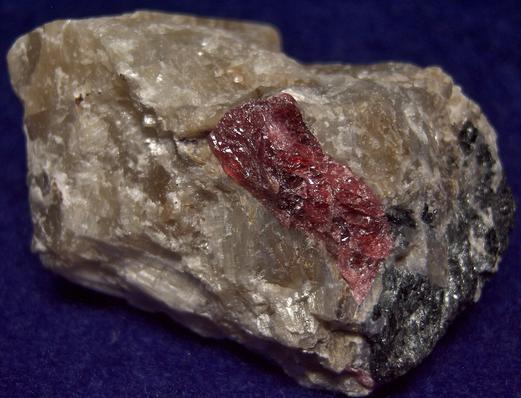 Pink SW LW fluorescing Agrellite, Eudialyte, Britholite-(Ce) crystals,Amphibole, Kipawa alkaline complex, Les Lacs-du-Temiscamingue, Temiscamingue RCM, Abitibi-Temiscamingue, Quebec, Canada