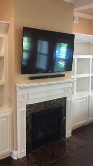 charlotte nc tv on fireplace mounting company, 4k ultra hd tv mounted on fireplace with floating sound bar