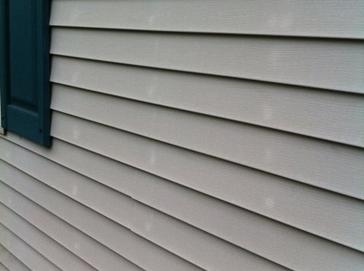 Nail spots on vinyl siding