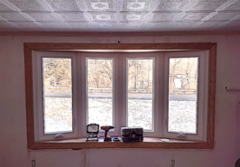 Bay window before caulking and painting white.
