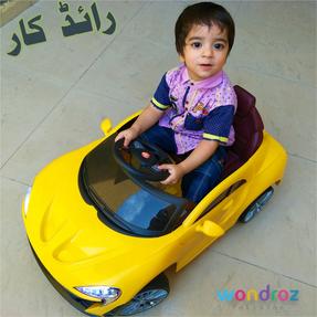 kids ride car in Pakistan