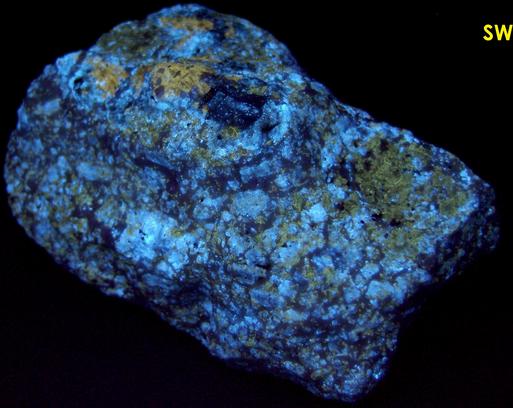 fluorescent DIOPSIDE, PHLOGOPITE, PYRITE, CALCITE - Edwards, Balmat-Edwards Zinc District, St. Lawrence County, New York, USA