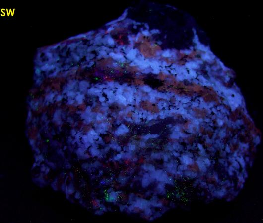 fluorescent SCAPOLITE and PLAGIOCLASE Albite-Anorthite, BIOTITE mica, CORUNDUM Sapphire - York River area, Dungannon Township, Hastings Co., Ontario, Canada