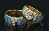Australian opal wedding ring set with white sapphires.