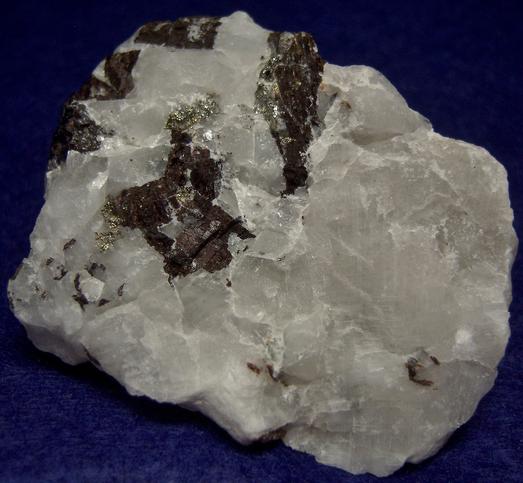 fluorescent CRYOLITE with SIDERITE, Ivigtut Cryolite deposit, Ivittuut (Ivigtut), Arsuk Firth, Arsuk, Sermersooq (Kitaa Province; West Greenland), Greenland, Denmark