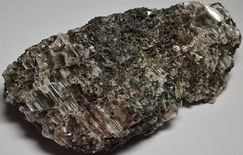 GYPSUM, MAGNETITE, fluorescent CALCITE, MALACHITE - Sterling Mine, Sterling Hill, Ogdensburg, Franklin Mining District, Sussex County, New Jersey, USA
