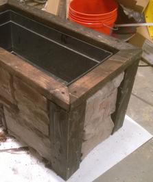 How to build an easy DIY stone veneer raised planter. FREE step by step instructions. www.DIYeasycrafts.com