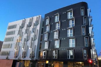 Dark brown and white 5 story condos