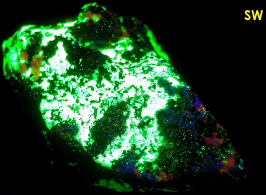 fluorescing WILLEMITE, HARDYSTONITE, CALCITE, FRANKLINITE - Franklin Mine, Franklin, Franklin Mining District, Sussex County, New Jersey, USA – Franklinite and Hardystonite type locality