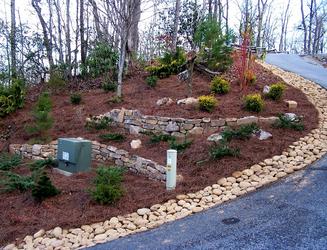 Stone walls on hillside to control erosion in Clayton, GA.