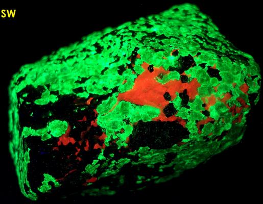 fluorescent CALCITE, phosphorescent WILLEMITE with FRANKLINITE, Sterling Mine, Sterling Hill, Ogdensburg, Franklin Mining District, Sussex County, New Jersey, USA, type locality