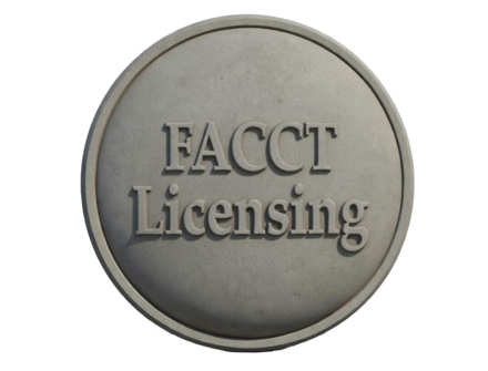 The words FACT licensing on a round stone image.