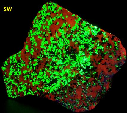 fluorescing Willemite, Hardystonite, Rhodonite, Franklinite, Calcite -Franklin Mine, Franklin, Franklin Mining District, Sussex County, New Jersey, USA