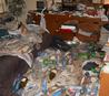 A filthy room representing Hazmat Cleanup gross filth cleaning services in Tampa, FL.