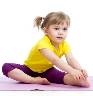 Girl stretching, kids yoga class, Yoga classes at Learning Allegro, Chester Springs, Downingtown, Pottstown, Glenmoore