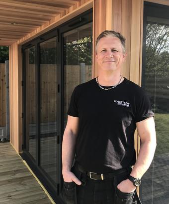 Photo of Jason Robertson, owner of Robertson Garden Rooms