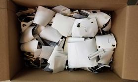 box-of-sewer-water-damaged-photos-curled-rolled