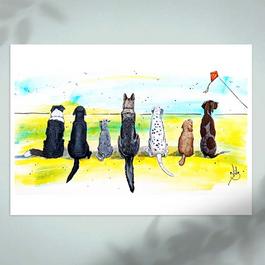 back view of 7 dogs looking towards the ocean