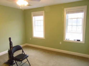 After bedroom wall painting with green walls.