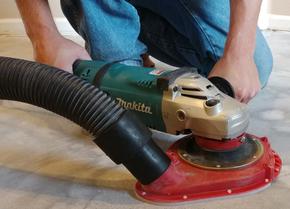 Dust free tile removal sander grinding down the thinset beneath the flooring